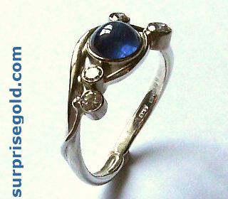 blue cabochon sapphire and diamond ring