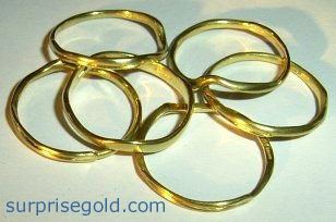 a group of organic design wedding rings