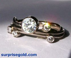 one .5 carat diamond and four smaller diamonds