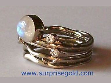 Handmade moonstone rings with matching wedding rings
