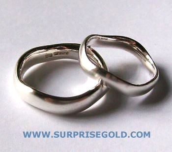 pair of wavy wedding bands