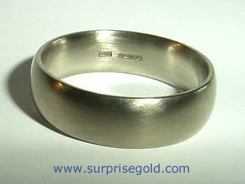 mans wide court section wedding ring