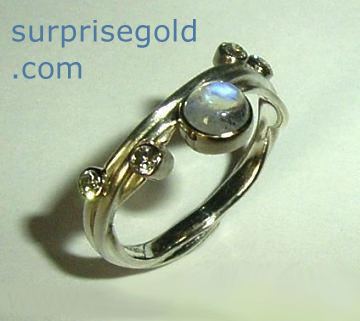 moonstone with four non conflict diamonds