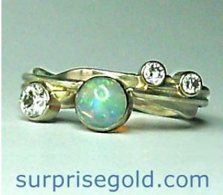diamond and opal engagement ring