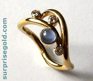 sapphire and diamond curl ring