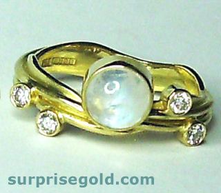 diamond and moonstone engagement ring in yellow gold
