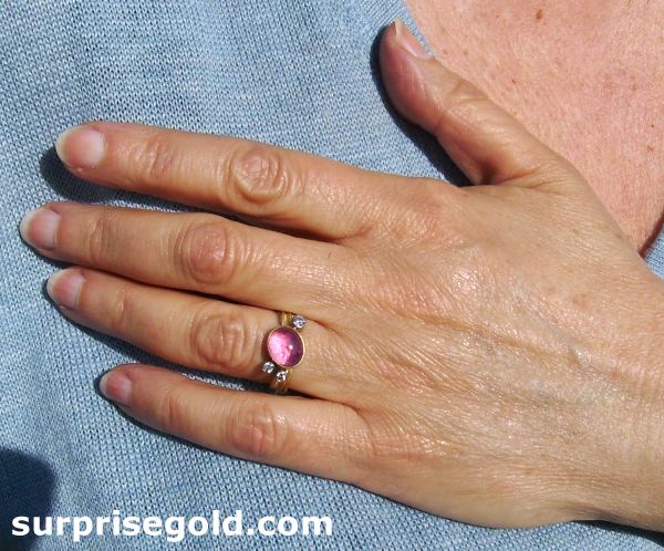 pink tourmaline ring being worn