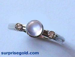 5mm moonstone and two diamonds