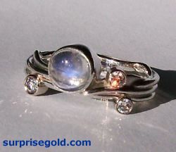 moonstone and three diamonds