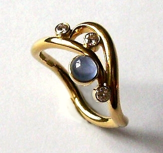 sapphire and diamond curl ring design